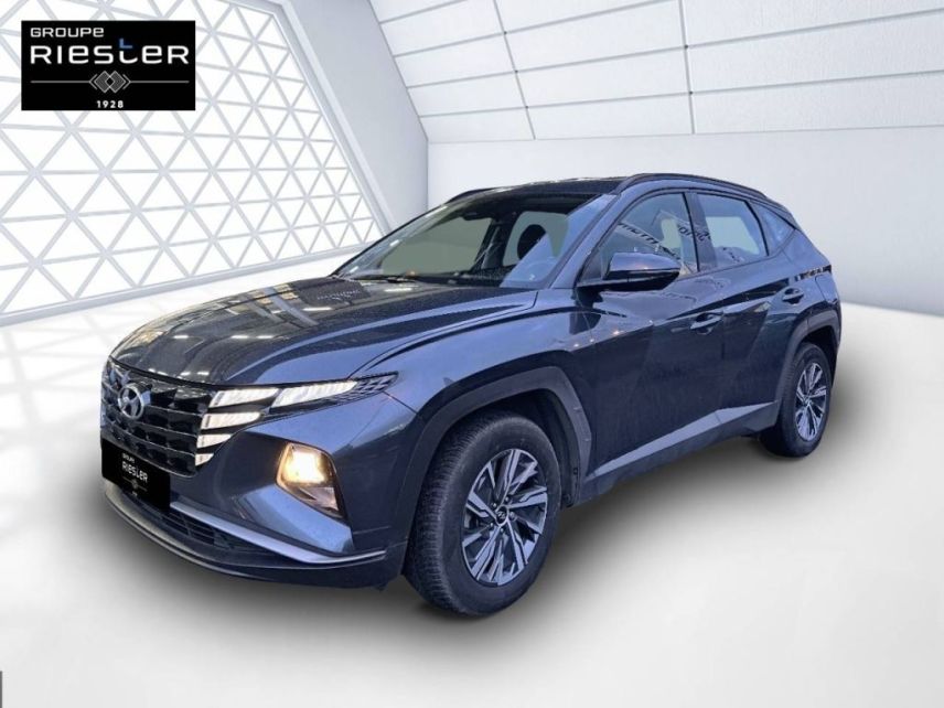 75010 : Hyundai Paris Nord - Goncourt Automobiles - HYUNDAI TUCSON Intuitive - TUCSON IV - gris - Boîte automatique - Essence / Courant électrique