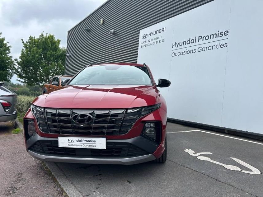 14112 : Hyundai Caen - Trajectoire Automobiles - HYUNDAI Tucson - Tucson - Sunset Red Métal - Traction - Hybride : Essence/Electrique