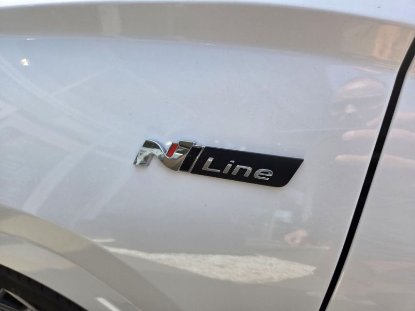 75010 : Hyundai Paris Nord - Goncourt Automobiles - HYUNDAI TUCSON N Line Executive - TUCSON IV - Blanc - Boîte automatique - Essence / Courant électrique