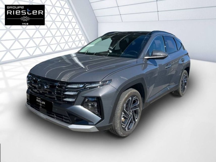 75010 : Hyundai Paris Nord - Goncourt Automobiles - HYUNDAI TUCSON Executive - TUCSON IV - gris - Boîte automatique - Essence / Courant électrique