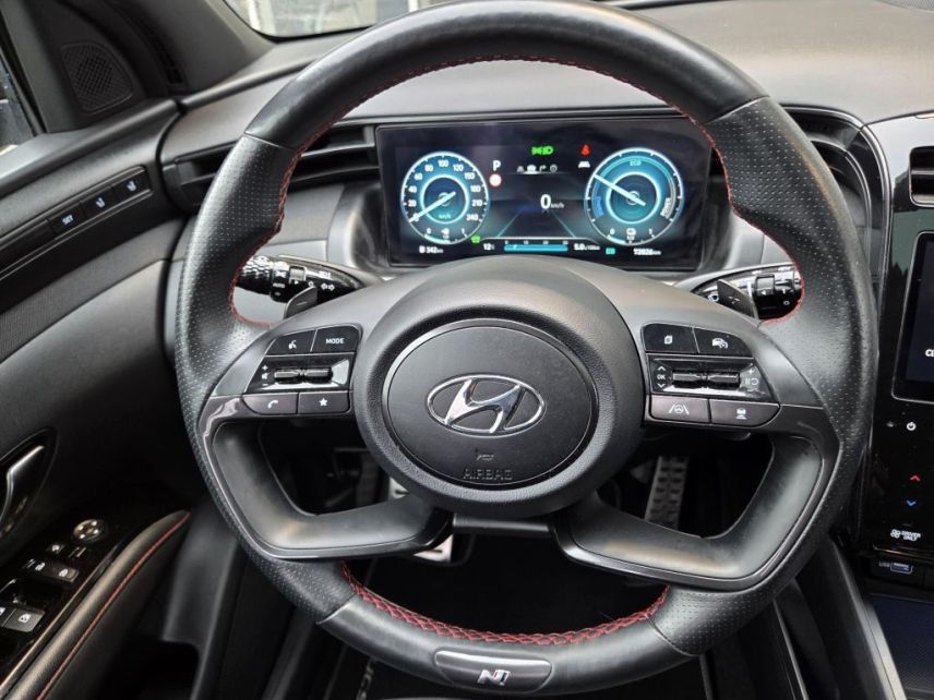 75010 : Hyundai Paris Nord - Goncourt Automobiles - HYUNDAI TUCSON N Line Executive - TUCSON IV - Gris - Boîte automatique - Essence / Courant électrique