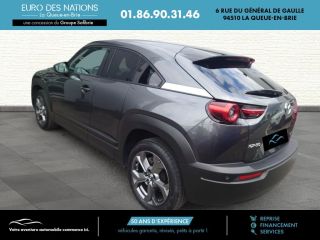 75010 : Hyundai Paris Nord - Goncourt Automobiles - MAZDA MX-30 2020 Industrial Vintage - MX-30 ELECTRIQUE - Gris - Automate à fonct. Continu - Courant électrique