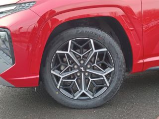 92250 : Hyundai Motor Company - HYUNDAI Tucson - Tucson - Sunset Red Métal - Transmission intégrale - Hybride rechargeable : Essence/Electrique