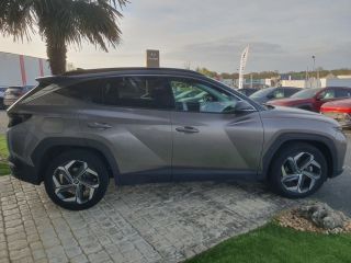 75010 : Hyundai Paris Nord - Goncourt Automobiles - HYUNDAI TUCSON Creative - TUCSON IV - Marron - Boîte automatique - Essence / Courant électrique