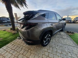 75010 : Hyundai Paris Nord - Goncourt Automobiles - HYUNDAI TUCSON Creative - TUCSON IV - Marron - Boîte automatique - Essence / Courant électrique