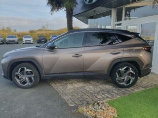 75010 : Hyundai Paris Nord - Goncourt Automobiles - HYUNDAI TUCSON Creative - TUCSON IV - Marron - Boîte automatique - Essence / Courant électrique