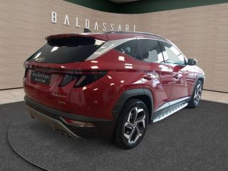 75010 : Hyundai Paris Nord - Goncourt Automobiles - HYUNDAI TUCSON Executive - TUCSON IV - Rouge - Boîte automatique - Essence / Courant électrique