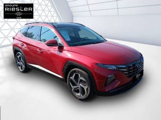 75010 : Hyundai Paris Nord - Goncourt Automobiles - HYUNDAI TUCSON Executive - TUCSON IV - Rouge - Boîte automatique - Essence / Courant électrique