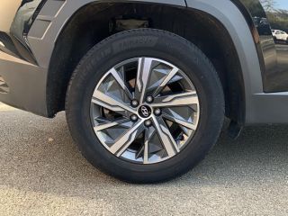 75010 : Hyundai Paris Nord - Goncourt Automobiles - HYUNDAI TUCSON Creative - TUCSON IV - Noir - Boîte automatique - Essence / Courant électrique