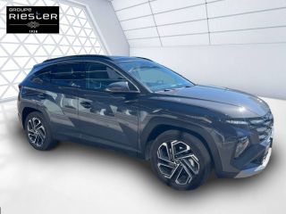 75010 : Hyundai Paris Nord - Goncourt Automobiles - HYUNDAI TUCSON Executive - TUCSON IV - gris - Boîte automatique - Essence / Courant électrique