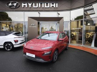 19100 : Hyundai Brive-la-Gaillarde - Garage Pouget - HYUNDAI Kona - Kona - Sunset Red Métal - Traction - Electrique