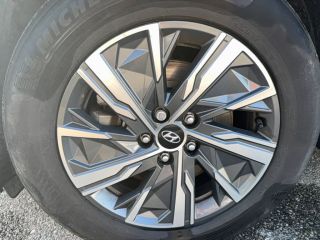 75010 : Hyundai Paris Nord - Goncourt Automobiles - HYUNDAI TUCSON Business - TUCSON IV - Gris - Boîte automatique - Essence / Courant électrique