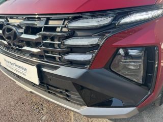 14112 : Hyundai Caen - Trajectoire Automobiles - HYUNDAI Tucson - Tucson - Ultimate Red Métal - Traction - Hybride : Essence/Electrique