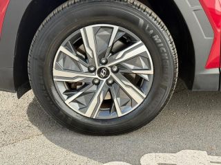 14112 : Hyundai Caen - Trajectoire Automobiles - HYUNDAI Tucson - Tucson - Sunset Red Métal - Traction - Hybride : Essence/Electrique